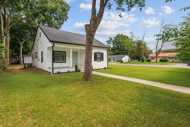 706 Poplar Ave, Murfreesboro, TN 37130 - view of front of property with a front lawn, a porch, and a shingled roof