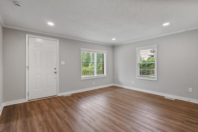706 Poplar Ave, Murfreesboro, TN 37130 - foyer featuring plenty of natural light, crown molding, wood finished floors, and recessed lighting