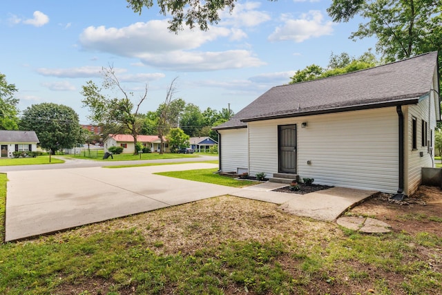 706 Poplar Ave, Murfreesboro, TN 37130 - back of house featuring a yard and entry steps
