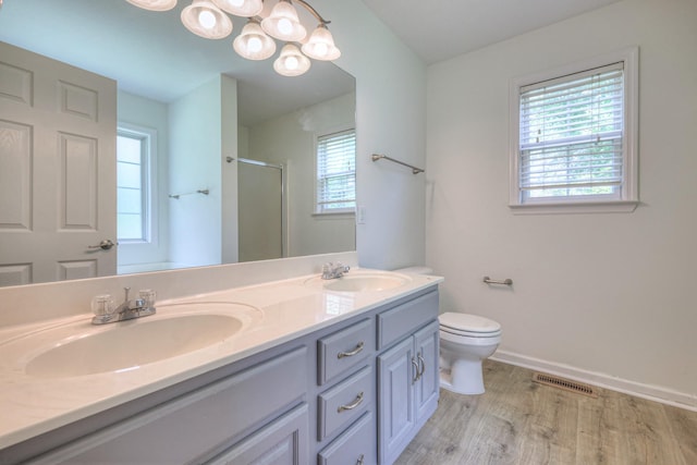 2902 Crenshaw Ct, Spring Hill, TN 37174 - full bath with a shower stall, double vanity, wood finished floors, and a chandelier