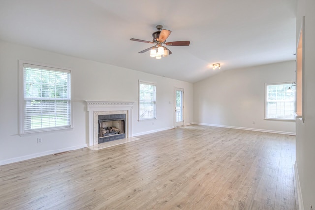 2902 Crenshaw Ct, Spring Hill, TN 37174 - unfurnished living room featuring a fireplace, lofted ceiling, ceiling fan, and healthy amount of natural light