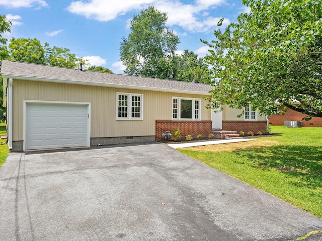 206 Elk Acre Dr, Estill Springs, TN 37330 - ranch-style house with crawl space, an attached garage, a front yard, asphalt driveway, and a shingled roof