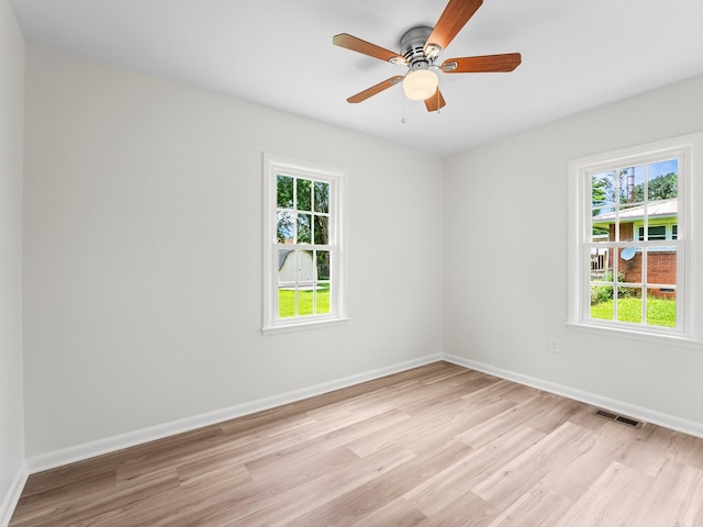 206 Elk Acre Dr, Estill Springs, TN 37330 - unfurnished room featuring plenty of natural light, light wood finished floors, and a ceiling fan