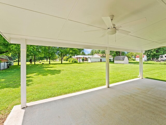 206 Elk Acre Dr, Estill Springs, TN 37330 - view of green lawn with a patio area, a ceiling fan, and a storage shed