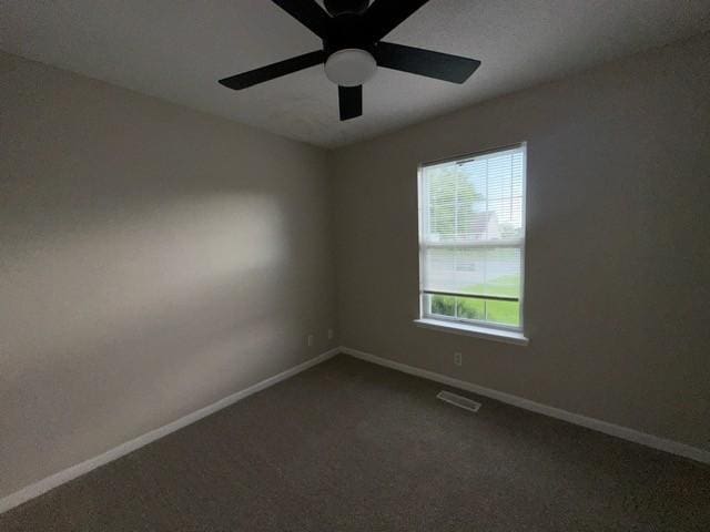4073 Challis Dr, Clarksville, TN 37040 - empty room featuring dark carpet and ceiling fan