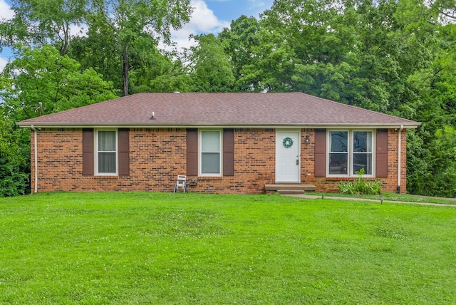 305 Barry Dr, Clarksville, TN 37040 - ranch-style house with a front lawn, brick siding, and a shingled roof