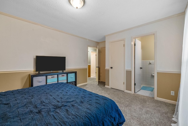 305 Barry Dr, Clarksville, TN 37040 - bedroom with ornamental molding, carpet flooring, a textured ceiling, and connected bathroom