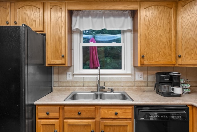 305 Barry Dr, Clarksville, TN 37040 - kitchen featuring black appliances, light countertops, and backsplash