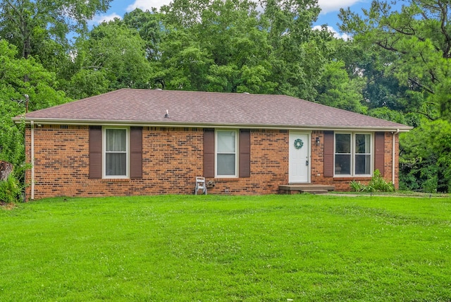 305 Barry Dr, Clarksville, TN 37040 - ranch-style home featuring brick siding, a front lawn, and a shingled roof
