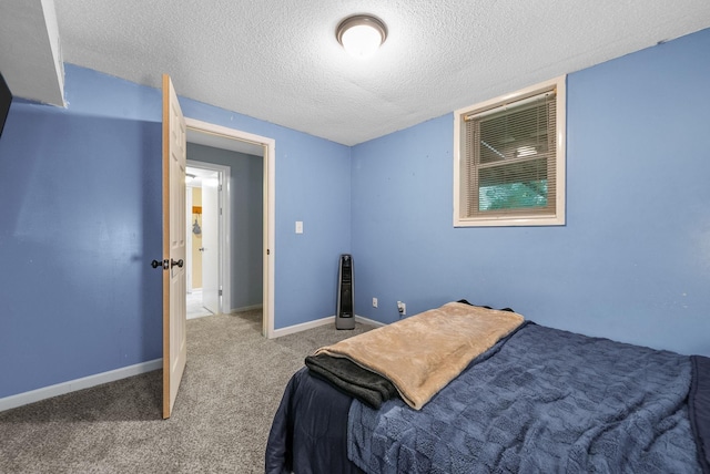 305 Barry Dr, Clarksville, TN 37040 - bedroom with a textured ceiling and carpet