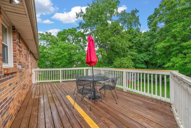 305 Barry Dr, Clarksville, TN 37040 - wooden deck featuring outdoor dining space and view of scattered trees