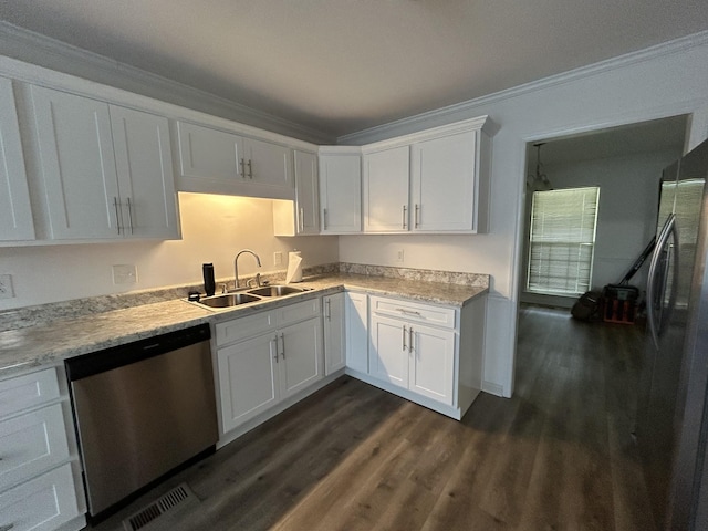 2519 Buckle St, Murfreesboro, TN 37129 - kitchen with appliances with stainless steel finishes, dark wood-style floors, white cabinetry, light countertops, and crown molding