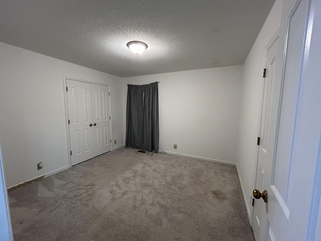 2519 Buckle St, Murfreesboro, TN 37129 - unfurnished bedroom with carpet floors, a textured ceiling, and a closet