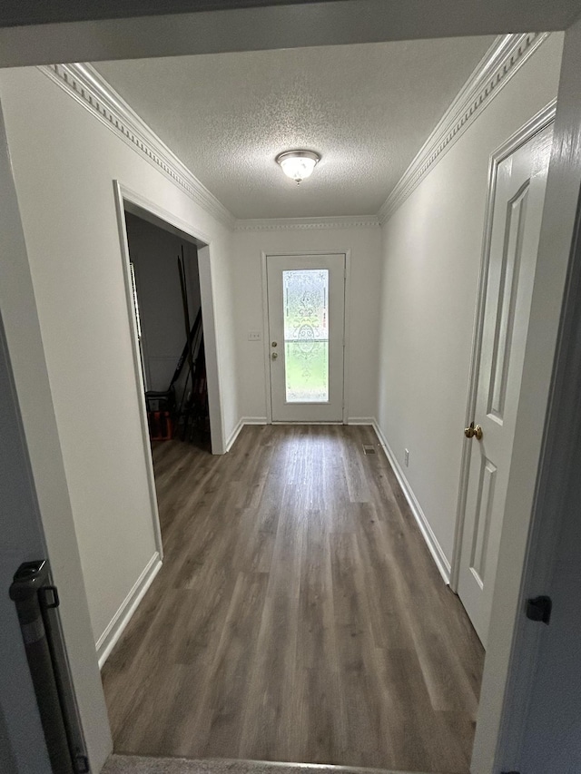 2519 Buckle St, Murfreesboro, TN 37129 - entryway with dark wood finished floors, crown molding, and a textured ceiling