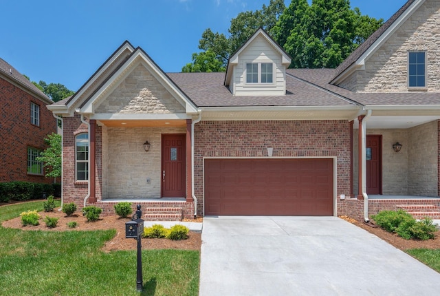 116 Nickolas Cir, Lebanon, TN 37087 - view of front of house with driveway, brick siding, a shingled roof, a garage, and a porch
