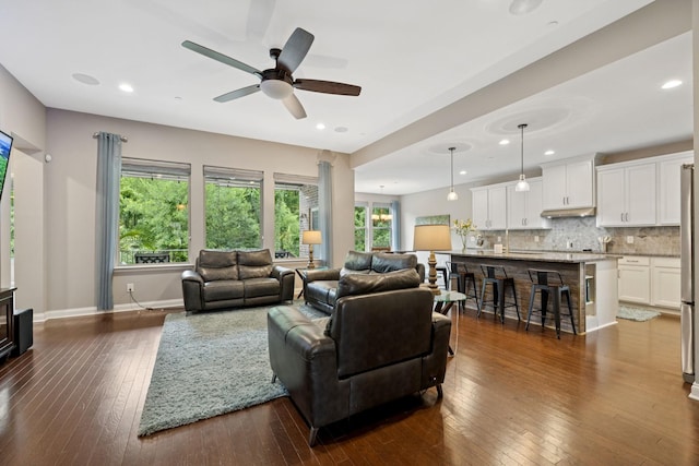 2229 Arbor Pointe Way, Hermitage, TN 37076 - living area with dark wood finished floors, healthy amount of natural light, ceiling fan, and recessed lighting