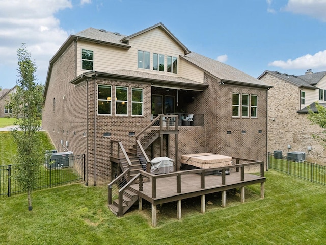 2229 Arbor Pointe Way, Hermitage, TN 37076 - rear view of property featuring a fenced backyard, a wooden deck, stairway, and brick siding