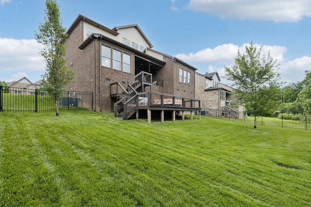 2229 Arbor Pointe Way, Hermitage, TN 37076 - back of property featuring stairway, a fenced backyard, brick siding, and a deck