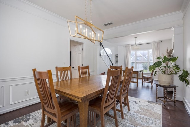 5925 Westheimer Dr, Brentwood, TN 37027 - dining space featuring wood finished floors, ornamental molding, and a chandelier