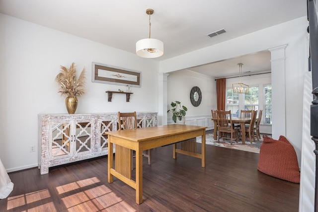 5925 Westheimer Dr, Brentwood, TN 37027 - dining space featuring wood finished floors, wainscoting, a chandelier, and ornate columns