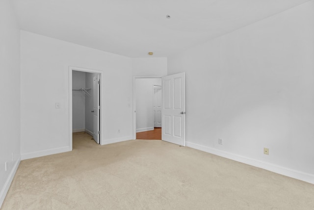 8441 Callabee Way # 14, Antioch, TN 37013 - unfurnished bedroom with light carpet, a spacious closet, and a closet