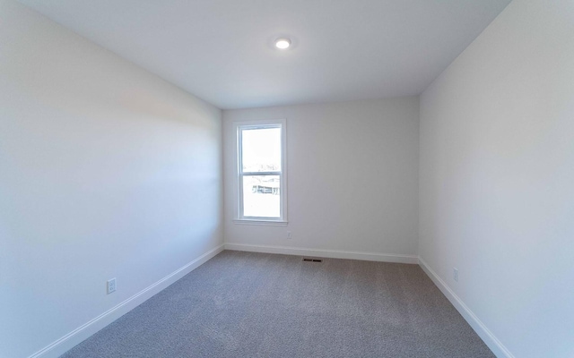 7938 Pine St, Fairview, TN 37062 - unfurnished room with baseboards and light colored carpet