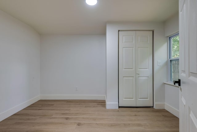 215 Kerr Ave, Murfreesboro, TN 37130 - unfurnished bedroom with a closet and light wood-style flooring