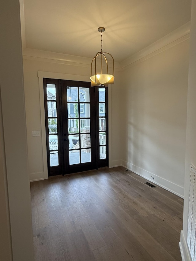 8007 Southvale Blvd, Franklin, TN 37064 - empty room with wood finished floors and ornamental molding