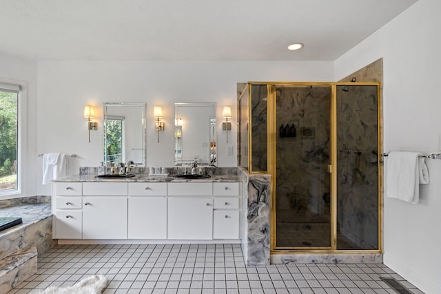 8530 Saundersville Rd, Mount Juliet, TN 37122 - full bath with vanity, a marble finish shower, tile patterned floors, and a tub with marble appearance