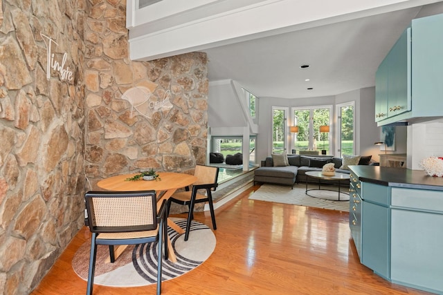 8530 Saundersville Rd, Mount Juliet, TN 37122 - dining space with light wood-style flooring and a fireplace
