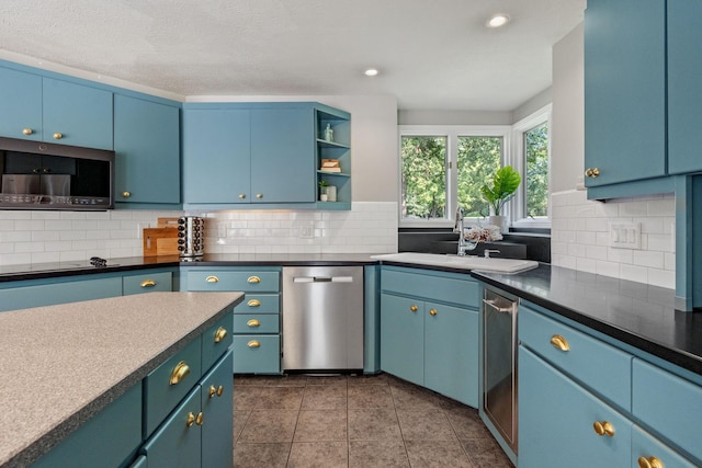 8530 Saundersville Rd, Mount Juliet, TN 37122 - kitchen featuring appliances with stainless steel finishes, backsplash, open shelves, recessed lighting, and dark tile patterned flooring