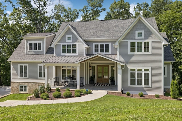 1556 Heller Rdg, Spring Hill, TN 37174 - view of front of property featuring french doors, a front lawn, and roof with shingles
