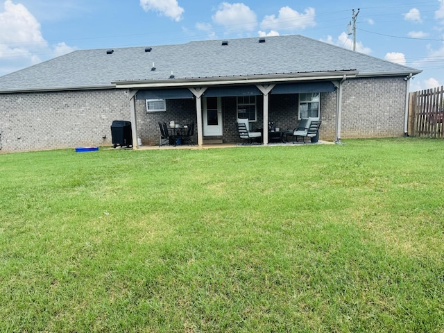 11013 Nevada Ave, Smyrna, TN 37167 - rear view of house featuring brick siding, a patio area, an outdoor living space, and roof with shingles