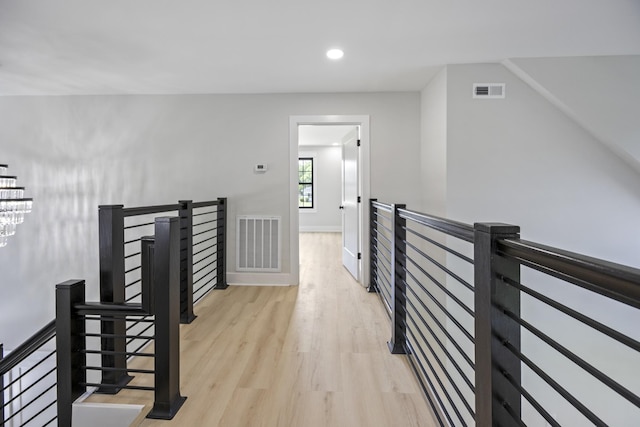 106 5th Ave N, Decherd, TN 37324 - hallway featuring an upstairs landing, light wood-style floors, and recessed lighting