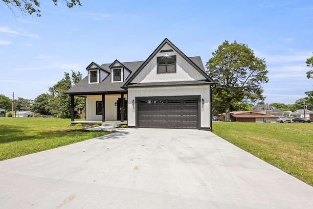 106 5th Ave N, Decherd, TN 37324 - modern inspired farmhouse featuring a garage, concrete driveway, board and batten siding, and a front lawn