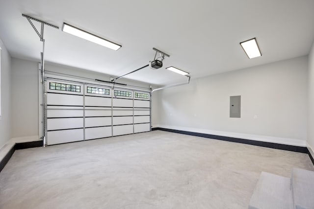 106 5th Ave N, Decherd, TN 37324 - garage featuring electric panel and a garage door opener