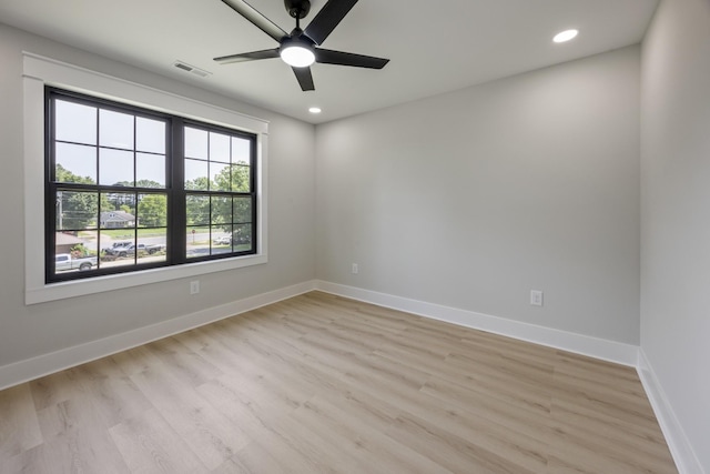 106 5th Ave N, Decherd, TN 37324 - spare room with light wood-type flooring, ceiling fan, and recessed lighting
