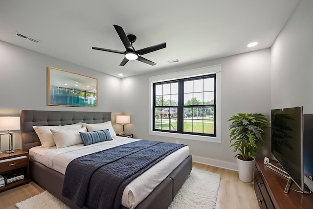106 5th Ave N, Decherd, TN 37324 - bedroom with light wood-type flooring, a ceiling fan, and recessed lighting