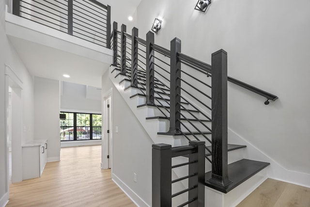 106 5th Ave N, Decherd, TN 37324 - stairway with wood finished floors and baseboards