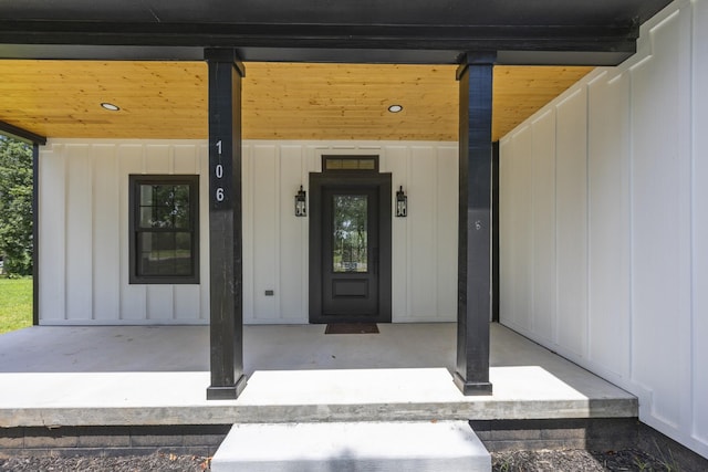 106 5th Ave N, Decherd, TN 37324 - entrance to property with a porch and board and batten siding