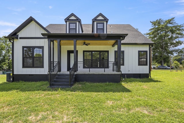 106 5th Ave N, Decherd, TN 37324 - modern farmhouse with covered porch, ceiling fan, a front lawn, roof with shingles, and board and batten siding