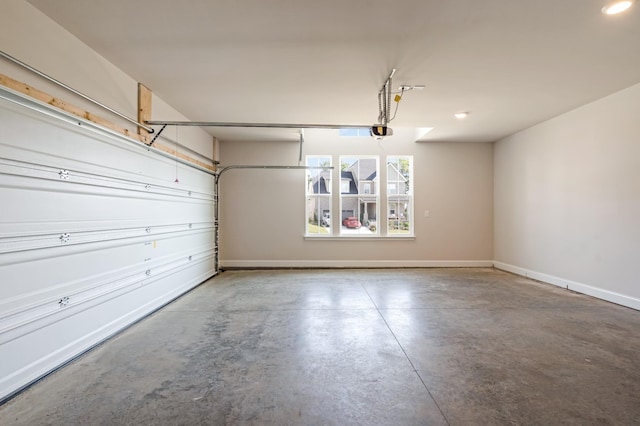 204 Phillips Bnd, Spring Hill, TN 37174 - garage featuring a garage door opener and recessed lighting