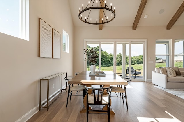 204 Phillips Bnd, Spring Hill, TN 37174 - dining room with wood finished floors, beam ceiling, and a chandelier