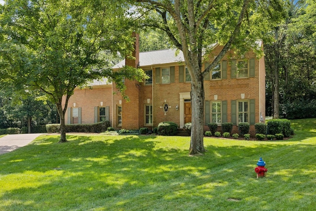 712 Roxburgh Cv, Brentwood, TN 37027 - view of front facade featuring a front lawn and brick siding