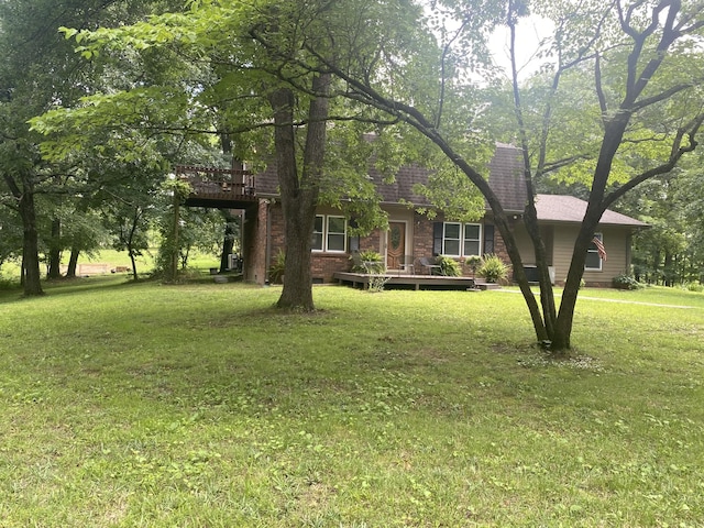 3240 Valley View Ct, Goodlettsville, TN 37072 - view of front of property featuring a deck, a front yard, and brick siding