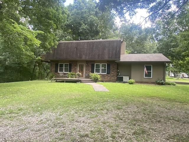 3240 Valley View Ct, Goodlettsville, TN 37072 - dutch colonial with covered porch, a front yard, roof with shingles, and brick siding