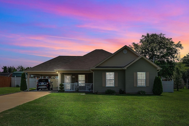 1107 Moreno Ln, Lewisburg, TN 37091 - ranch-style home featuring a porch, a carport, and driveway