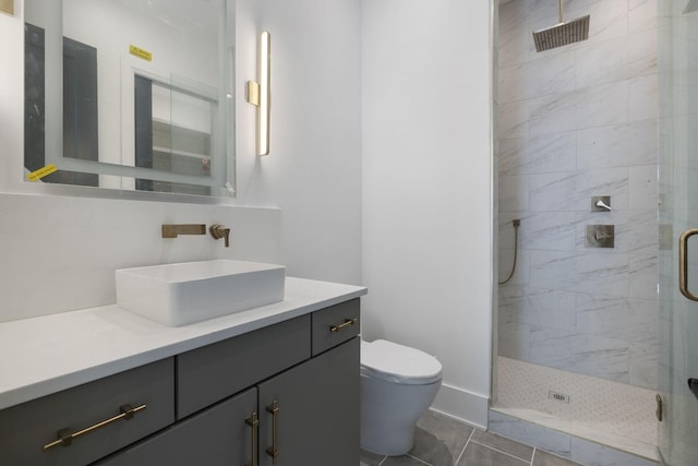 1884 Barnstaple Ln, Brentwood, TN 37027 - bathroom featuring a stall shower, vanity, and tile patterned floors