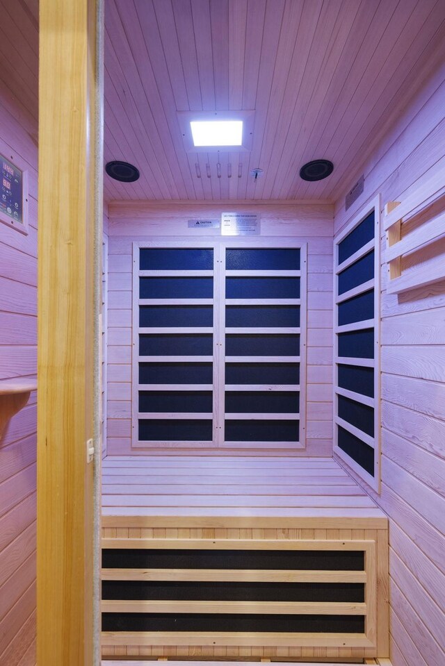 1884 Barnstaple Ln, Brentwood, TN 37027 - detailed view of a sauna, wood walls, wooden ceiling, and built in shelves