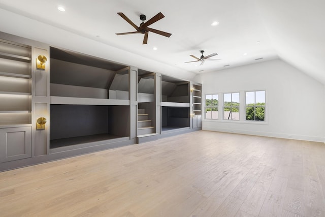 1884 Barnstaple Ln, Brentwood, TN 37027 - unfurnished living room with ceiling fan, recessed lighting, light wood finished floors, built in shelves, and lofted ceiling